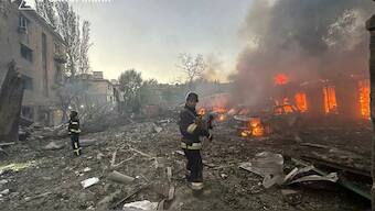 In this photo provided by the Ukrainian Emergency Service, firefighters put out the fire after Russia attacked the city with guided bombs overnight in Zaporizhzhia, Ukraine, Sunday, Sept. 29, 2024. - AP