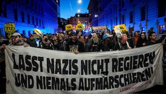 Anti right wing protesters shout slogans holding a banner that reads "Don't let Nazis rule and never let them march" near the parliament building, in Vienna, Austria, Sunday, Sept. 29, 2024, after polls closed in the country's national election. Photo- AP