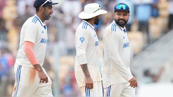 R Ashwin, Ravindra Jadeja and Rohit Sharma interact after India defeated Bangladesh in the first Test on Sunday. AP 