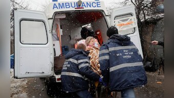 Medical specialists transport an injured woman to an ambulance following shelling in the city of Donetsk, Ukraine March 3, 2022. File image/Reuters