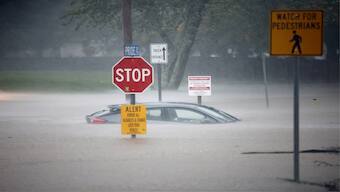 A stranded car sits in flood waters as Tropical Storm Helene strikes, in Boone, North Carolina, US, on Friday. Reuters