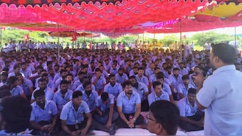 Workers of a Samsung facility listen to a speaker during a strike to demand higher wages at its Sriperumbudur plant near the city of Chennai. Reuters
