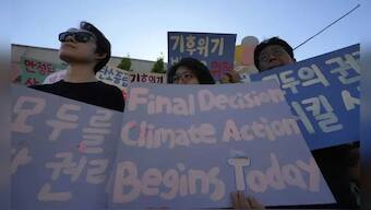 Tens of thousands of protesters took to the streets in Seoul, south Korea over climate justice inaction. Representative image/AP
