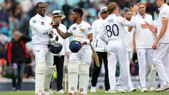Angelo Mathews and Pathum Nissanka celebrate after guiding Sri Lanka to a commanding eight-wicket victory over England in the third Test at The Oval. Reuters