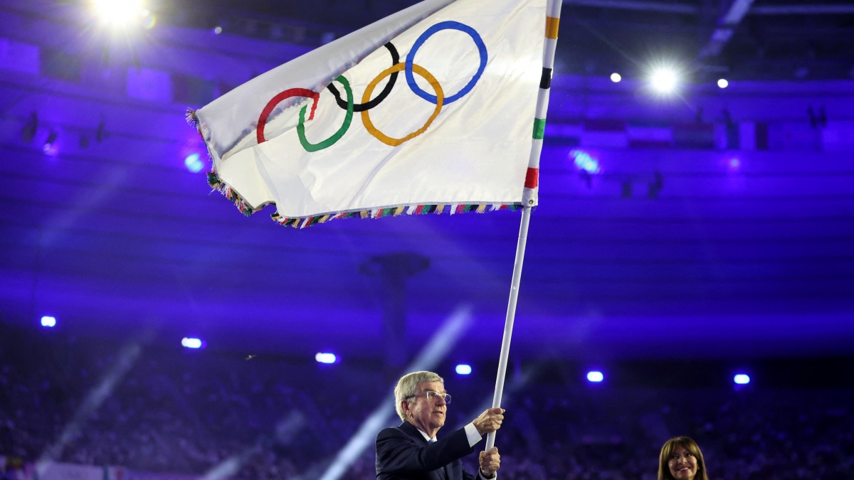International Olympic Committee (IOC) President Thomas Bach waves the Olympic flag during the Paris Olympics closing ceremony. Reuters International Olympic Committee (IOC) President Thomas Bach waves the Olympic flag during the Paris Olympics closing ceremony. Reuters