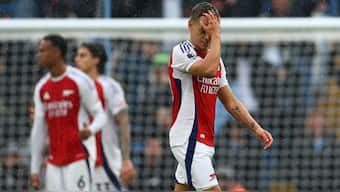Arsenal's Leandro Trossard reacts after receiving a red card against Manchester City. Reuters 