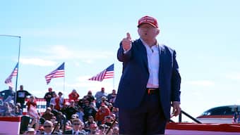 Republican presidential nominee former President Donald Trump gestures as he departs a campaign event at Central Wisconsin Airport, Saturday, Sept. 7, 2024, in Mosinee, Wis.AP