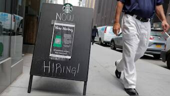 A sign advertising job openings is seen outside of a Starbucks in Manhattan, New York City, US. Source: REUTERS/File Photo.