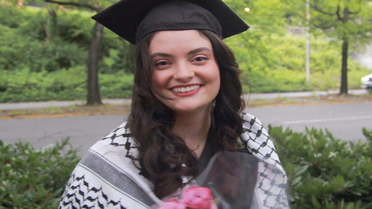 Turkish-American woman Aysenur Ezgi Eygi, a graduate of the University of Washington, poses wearing her mortarboard and keffiyeh in a family photograph taken at the University of Washington's 2024 commencement ceremony, in Seattle, Washington, US, on June 8, 2024. Reuters File Turkish-American woman Aysenur Ezgi Eygi, a graduate of the University of Washington, poses wearing her mortarboard and keffiyeh in a family photograph taken at the University of Washington's 2024 commencement ceremony, in Seattle, Washington, US, on June 8, 2024. Reuters File