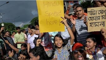 Demonstrators shout slogans during a protest against what they say is violence against Hindu communities during ongoing unrest, in Dhaka, Bangladesh, August 9, 2024. REUTERS