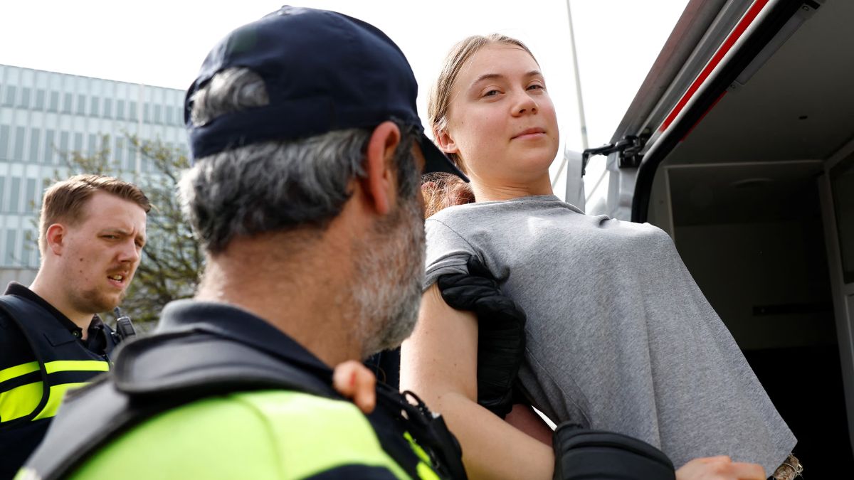Law enforcement officials taking Greta Thunberg in custody. File Photo Law enforcement officials taking Greta Thunberg in custody. File Photo