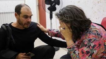 Colleagues of Aysenur Ezgi Eygi, US-Turkish activist who died after reportedly being shot in the West Bank town of Beita, react on news of her death in a hospital in Nablus in the occupied West Bank on September 6, 2024. AFP