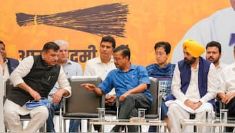 Delhi Chief Minister Arvind Kejriwal with Punjab CM Bhagwant Mann, AAP MP Sanjay Singh and other leaders during a party workers meeting, in New Delhi, September 15, 2024. PTI