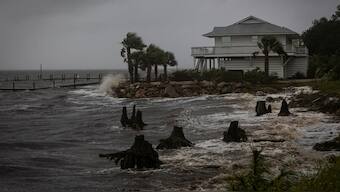 Waves impact a house seawall as Hurricane Helene intensifies before its expected landfall on Florida’s Big Bend, in Eastpoint, Florida, U.S. September 26, 2024. REUTERS