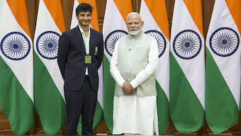 Prime Minister Narendra Modi with chess Grand Master Vidit Gujrathi during an interaction with 45th FIDE Chess Olympiad winning Indian teams, at his residence, in New Delhi. PTI