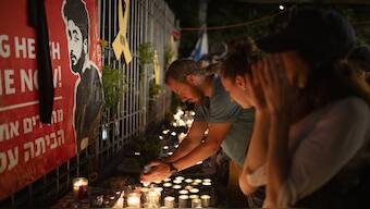 People light candles during a vigil in memory of slain hostage Hersh Goldberg-Polin in Jerusalem, Israel, Sunday. The Israeli-American was one of the most known faces of the hostage crisis. AP