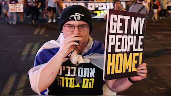 People rally to protest against the government and to show support for the hostages who were kidnapped during the deadly October 7 attack, amid the ongoing conflict in Gaza between Israel and Hamas, in Tel Aviv, Israel. Reuters