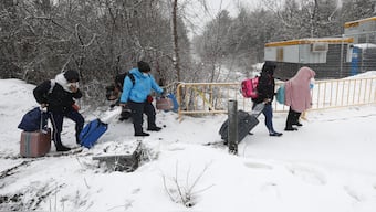 People at the Roxham Road border crossing in Champlain, New York, A rising number of Indians are using the US-Canada border to illegally gain access into America. Representational image/AFP