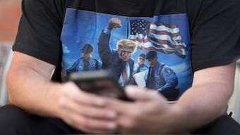 A Trump supporter wears T-shirt depicting Donald Trump. Two months after there was an attempt on his life, Trump was the target of another assassination bid on Sunday. AP