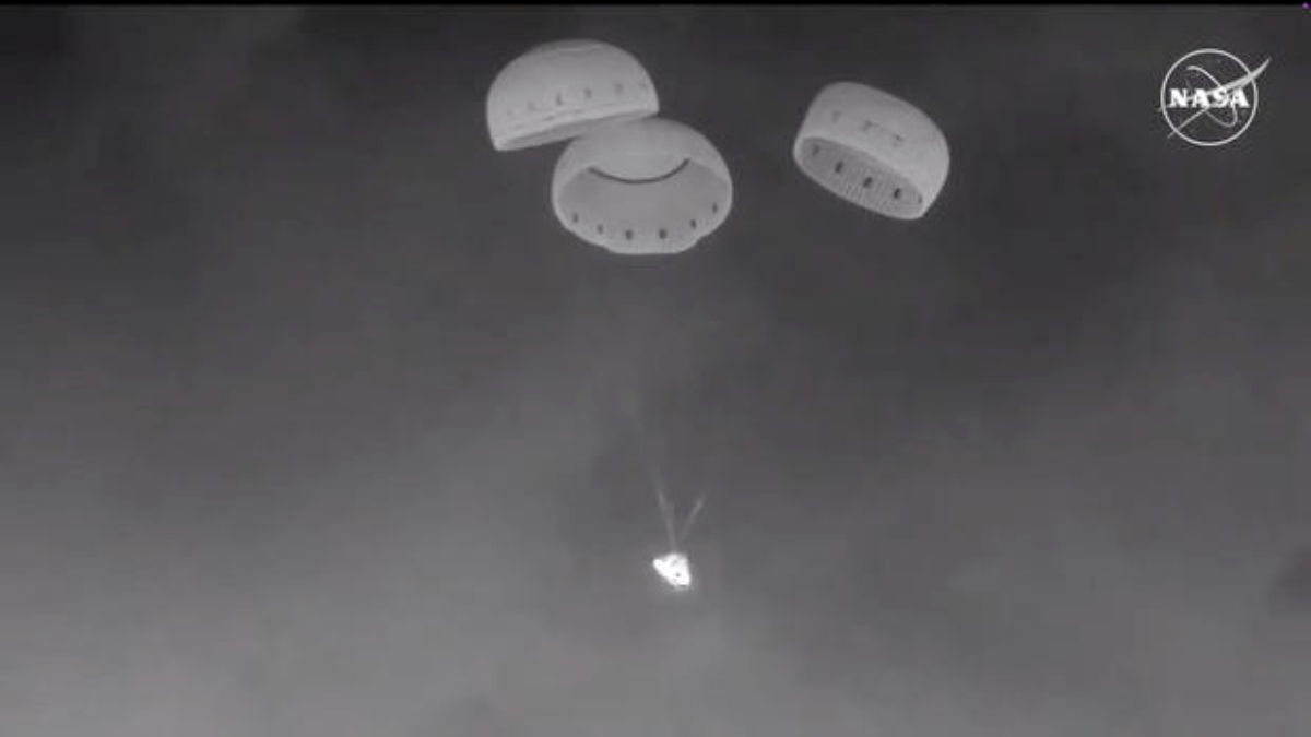 The crewless Boeing Starliner makes a parachute landing in the New Mexico desert after departing the International Space Station. NASA The crewless Boeing Starliner makes a parachute landing in the New Mexico desert after departing the International Space Station. NASA
