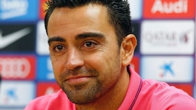 Xavi Hernandez to become next Manchester United manager? Photo of Barcelona legend and his son fuels speculation