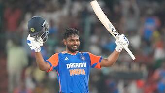 India's Sanju Samson celebrates after scoring a century against Bangladesh in the third T20I. AP 