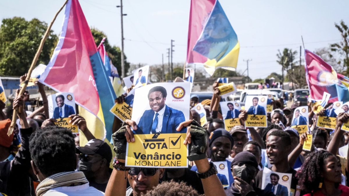 A poster of independent candidate Venacio Mondalane is held at an election rally in Maputo. AP A poster of independent candidate Venacio Mondalane is held at an election rally in Maputo. AP