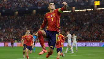 Spain's Alvaro Morata jumps in celebration after scoring against Serbia in their UEFA Nations League match in Cordoba. Reuters