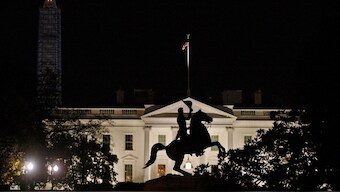 The statue of US President Andrew Jackson on his horse in the centre of Lafayette Park is silhouetted against the White House in front of the Washington Monument (L) in Washington, US, on November 17, 2013. Reuters