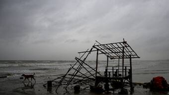 As per Odisha revenue and disaster management minister, as many as 10 districts are likely to be affected by Cyclone Dana that made landfall around midnight on Thursday. Source: AFP.