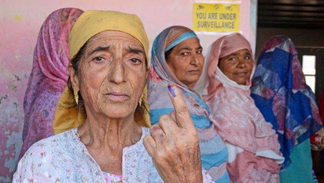 An woman shows her finger marked with indelible ink after casting vote at a polling station during the third and final phase of the Jammu and Kashmir Assembly elections, Singhpora, in Baramulla district. PTI