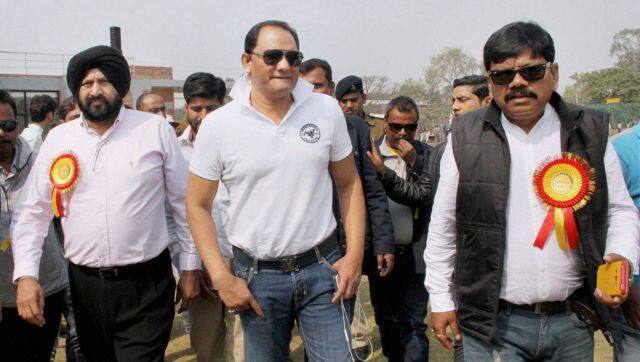 Former Indian cricketer Mohammad Azharuddin arrives at a function in Patna on Sunday. PTI 