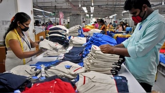 Workers conduct quality check before packing t-shirts at a textile factory of Texport Industries in Hindupur town in the southern state of Andhra Pradesh, India. Source: REUTERS | FILE. 
