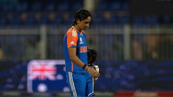 Captain Harmanpreet Kaur walks off dejectedly following India's nine-run defeat at the hands of Australia in their Women's T20 World Cup Group A match in Sharjah. AP