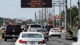Highway signage announces the impending arrival of Hurricane Milton and the evacuations zones on October. 8, 2024, in Port Richey, Floridaa. AP