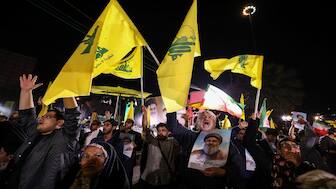 Iranians celebrate at Palestine Square in Tehran following Iran's air attack on Israel, on Tuesday. AFP