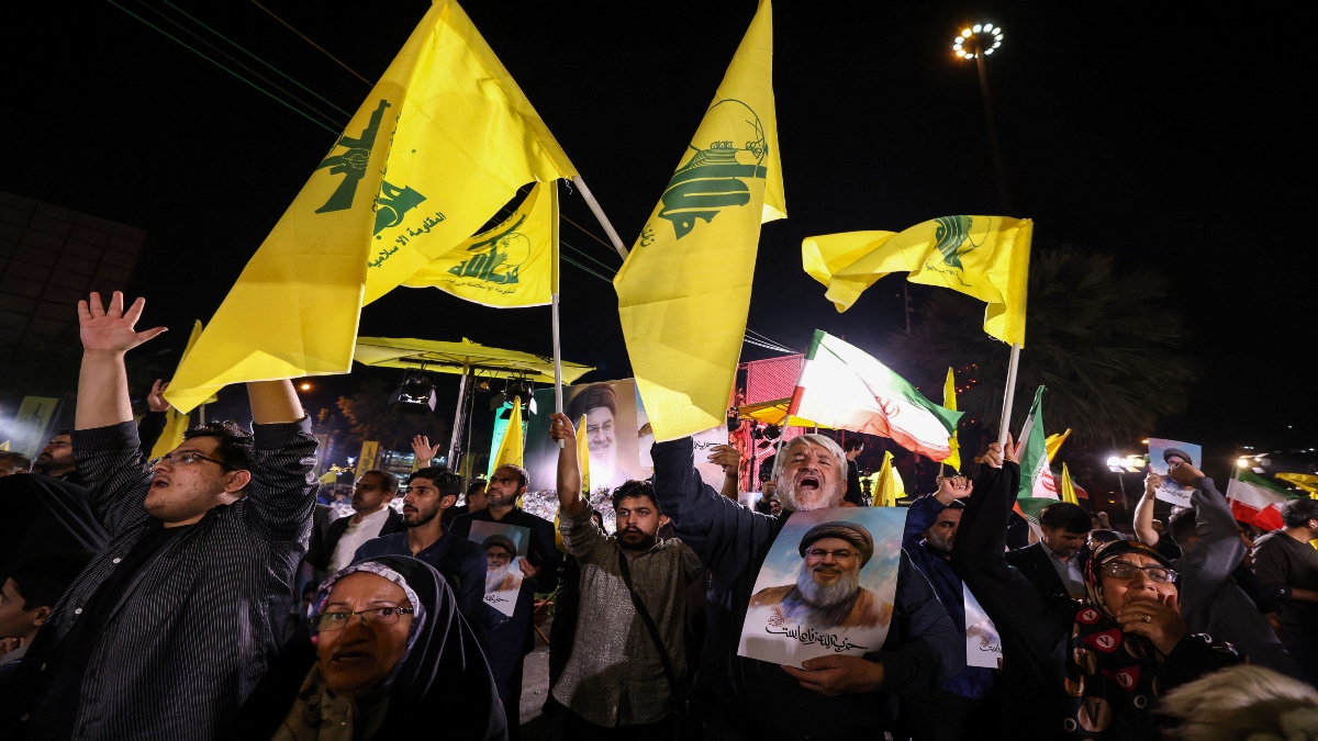 Iranians celebrate at Palestine Square in Tehran following Iran's air attack on Israel, on Tuesday. AFP Iranians celebrate at Palestine Square in Tehran following Iran's air attack on Israel, on Tuesday. AFP