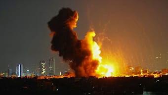 Smoke rises from the site of an Israeli airstrike that targeted a residential complex in the Leylaki neighbourhood in Beirut's southern suburbs on October 23, 2024. Source: AFP. 