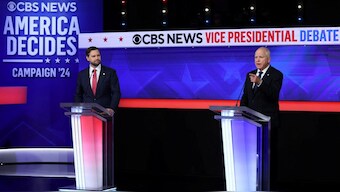 Democratic vice presidential nominee Minnesota Governor Tim Walz gestures as he speaks during a debate with Republican vice presidential nominee U.S. Senator JD Vance (R-OH) hosted by CBS in New York, US, October 1, 2024. Source: REUTERS.