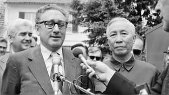Then US National Security Advisor Henry Kissinger and Le Duc Tho, member of Hanoi's Politburo, speak outside a suburban house at Gif-sur-Yvette in Paris after negotiations on June 13, 1973. File Image/AP