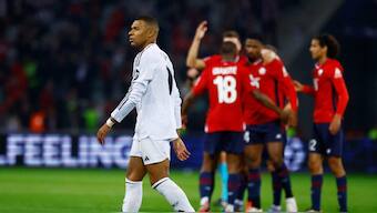 Lille players celebrate after beating Real Madrid in Champions League. Image: Reuters
