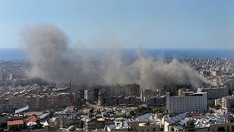 Smoke rises after Israeli airstrikes in Dahiyeh, Beirut, Lebanon, Thursday. AP