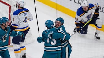Macklin Celebrini celebrates with teammates after scoring for San Jose Sharks on NHL debut. Image: AP