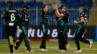 New Zealand's Fran Jonas celebrates with teammates after dismissing West Indies' Chedean Nation in the second semi-final of the 2024 ICC Women's T20 World Cup in Sharjah. AP