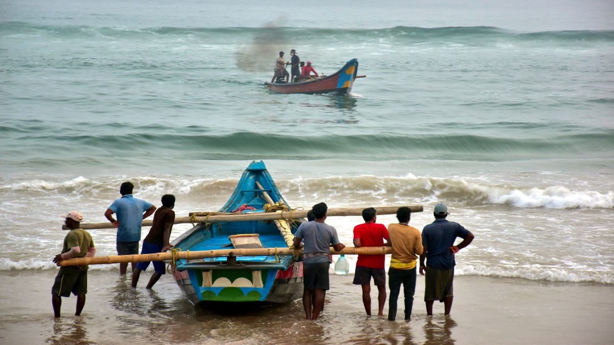 Fishermen shift their boats in preparations for Cyclone Dana, in Puri, Monday, October 21, 2024. PTI Fishermen shift their boats in preparations for Cyclone Dana, in Puri, Monday, October 21, 2024. PTI