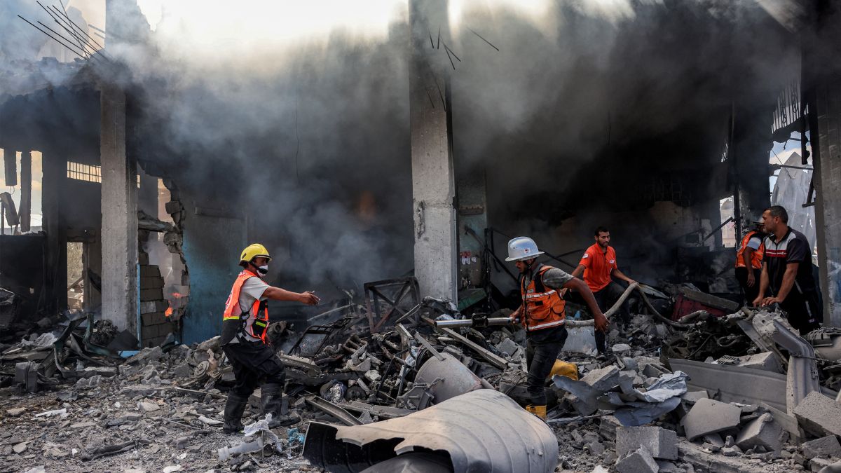 Palestinian civil defence firefighters extinguish a blaze in a building in Khan Yunis in the southern Gaza Strip on October 7, 2024 on the first anniversary of the ongoing war in the Palestinian territory between Israel and Hamas.- Photo- AFP Palestinian civil defence firefighters extinguish a blaze in a building in Khan Yunis in the southern Gaza Strip on October 7, 2024 on the first anniversary of the ongoing war in the Palestinian territory between Israel and Hamas.- Photo- AFP