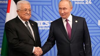 Russian President Vladimir Putin (R) greets Palestinian President Mahmoud Abbas during their bilateral meeting on the sidelines of the BRICS summit in Kazan on October 24, 2024. Image- AFP