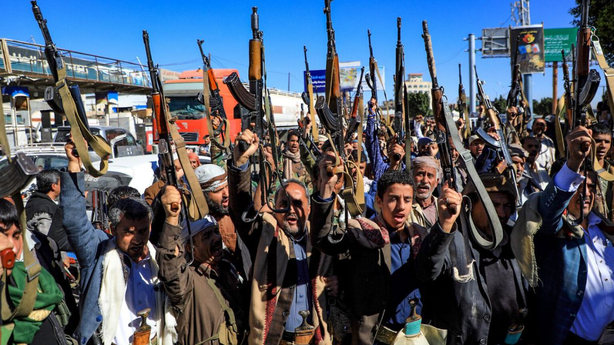 Houthi rebels holding their weapons. File Photo: AFP Houthi rebels holding their weapons. File Photo: AFP