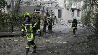 Ukrainian rescuers inspect the site of a Russian missile strike in Dnipro, eastern Ukraine, on October 26, 2024, amid the Russian invasion of Ukraine. Image- AFP