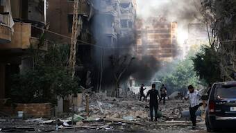 Residents check the damaged in the aftermath of overnight Israeli bombardment in Beirut’s southern suburbs, on September 28, 2024. File Photo- AFP